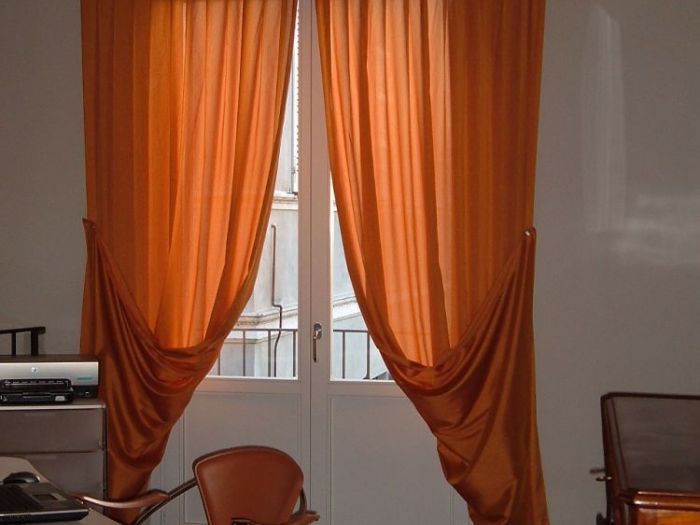 Archisio - Pezzoni Tappezzeria Tendaggi - Progetto Tende