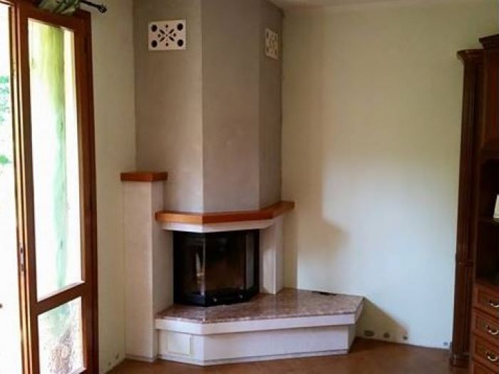 Archisio - Lavori Daltri Tempi - Progetto Caminetto ad angolo su misura