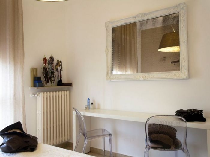 Archisio - Studio Ferretti - Progetto Da ufficio a residenza