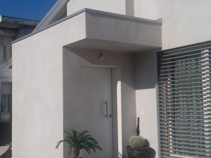 Archisio - Claudio Dagostino - Progetto Ristrutturazione con ampliamento di una abitazione unifamiliare