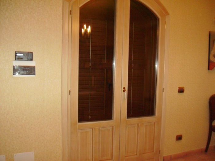 Archisio - Falegnameria Tuccitto - Progetto Porte in legno