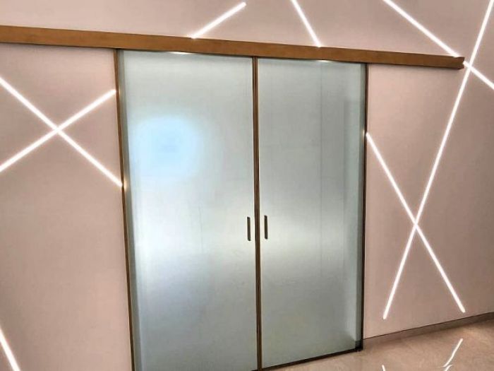 Archisio - Mp Glass - Progetto Porte e pareti divisorie in vetro