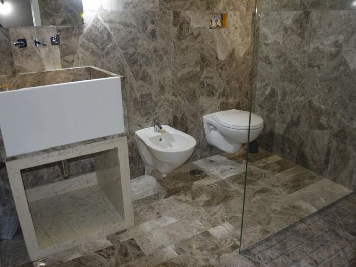 Archisio - Calabra Marmi - Progetto Bagni