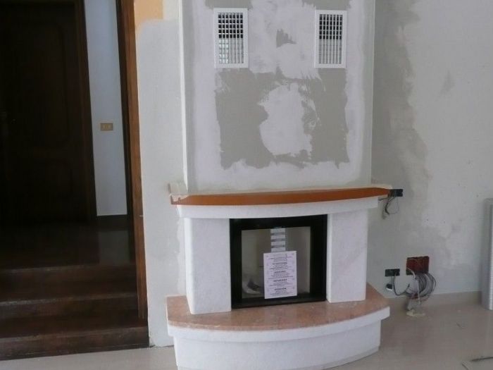 Archisio - Bagno Calore Design - Progetto Stufe e caminetti le nostre realizzazioni