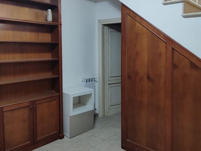 Archisio - Mani Srl Ristrutturazini - Progetto Restyling libreria su misura abitazione in roma zona axa