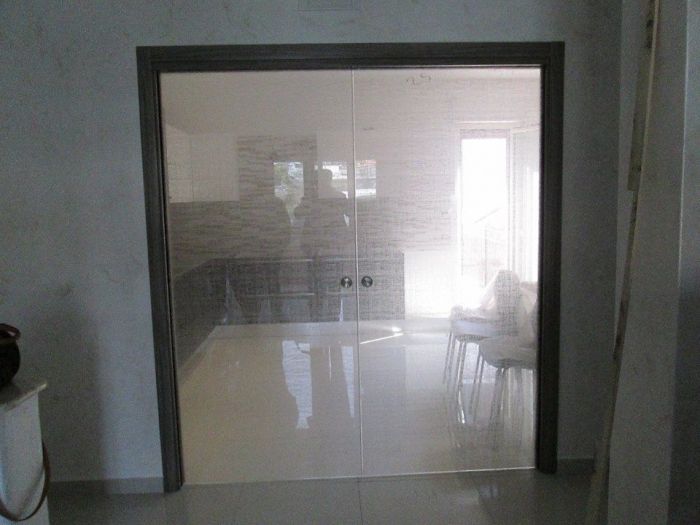 Archisio - Casa Energia Messina - Progetto Porte in vetro