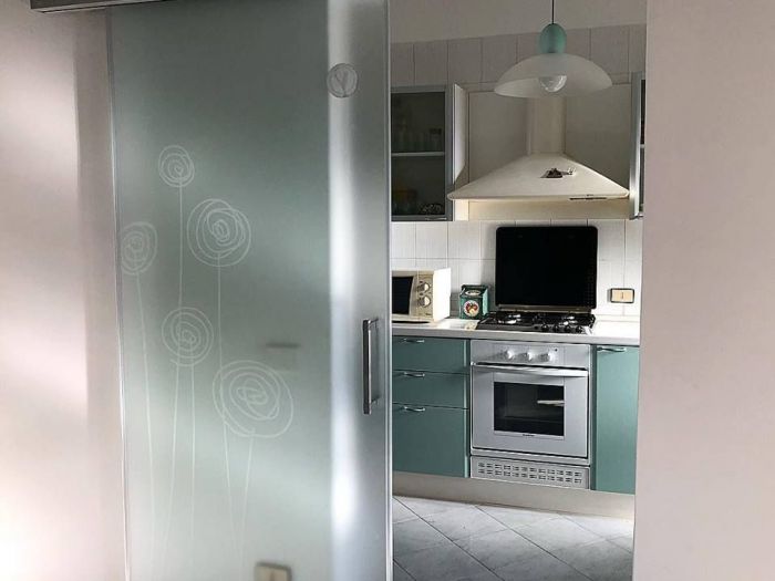 Archisio - Dueal Windows Doors - Progetto Porte