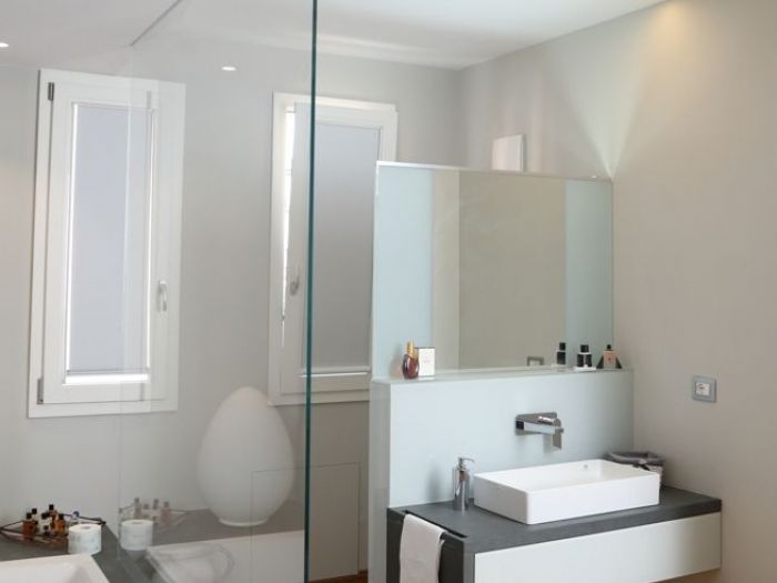 Archisio - Pierfrancesco Arnone - Progetto Progetto di ristrutturazione di un immobile su 2 livelli sviluppato per una coppia giovane abituata a viaggiare in giro per il mondo capace di fondere stili e idee