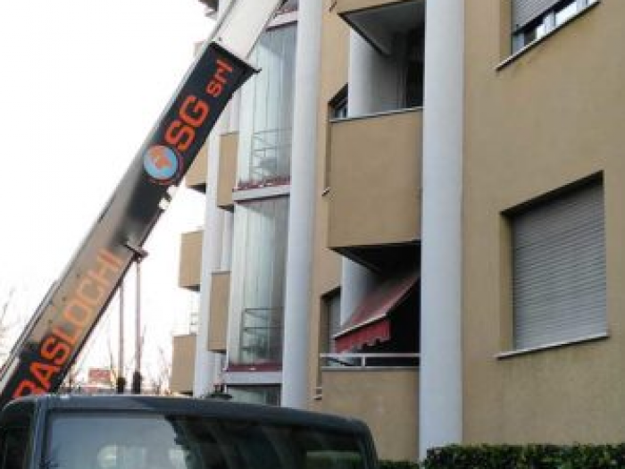 Archisio - Sg Traslochi E Trasporti - Progetto Servizi di logistica noleggio autoscala e self storage