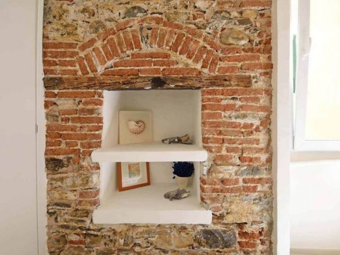 Archisio - Roberto Silvestri - Progetto Una casa a camogli storie e pareti colorate