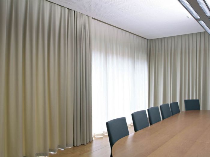 Archisio - Pezzoni Tappezzeria Tendaggi - Progetto Tende