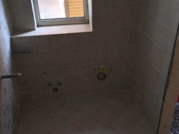 Archisio - Edilmultiservizi - Progetto Bagni