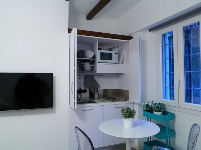 Archisio - Sizedesign Smart Kitchens Living - Progetto Cucine e mini cucine monoblocco a scomparsa