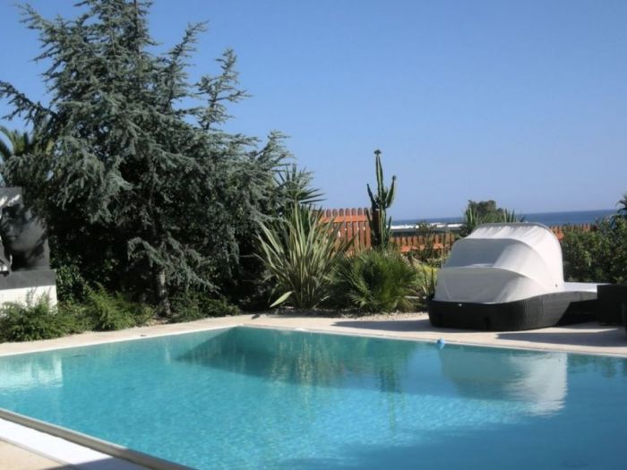 Archisio - Tiziana Galosi - Progetto Progettazione piscina e giardino di una villetta