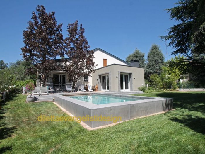 Archisio - Diletta Evangelisti - Progetto Restyling di villetta con aumento di volume e nuova piscina