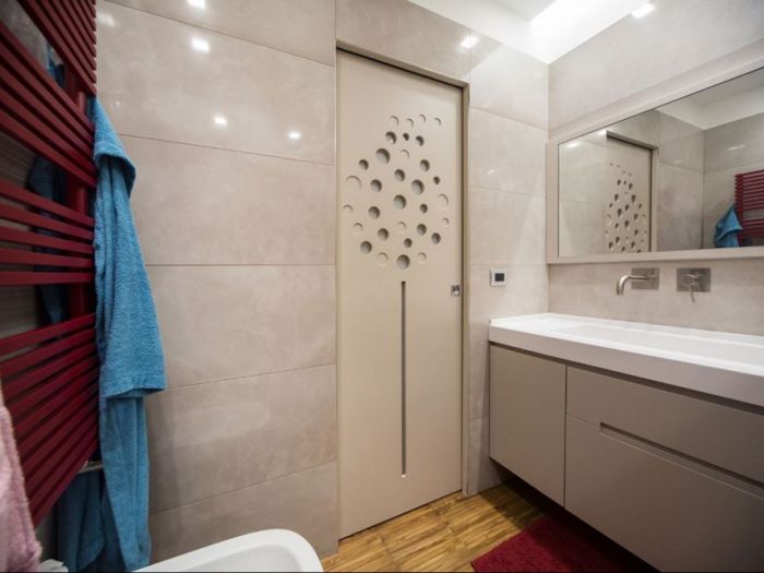 Archisio - Romindesign - Progetto Arredo bagno con porte amato soffio