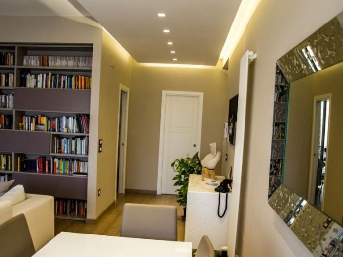 Archisio - Gabriele Palestini Arch D - Progetto Calore e design in 140mq