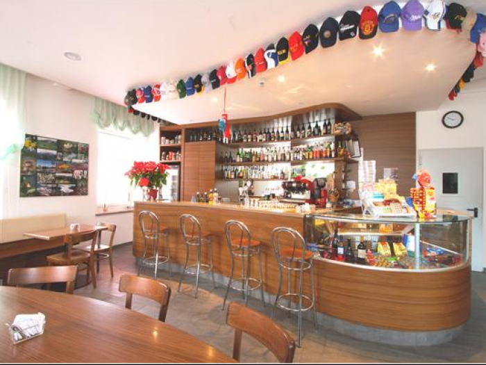 Archisio - Premiate Falegnamerie Sutrio - Progetto Spazi commerciali