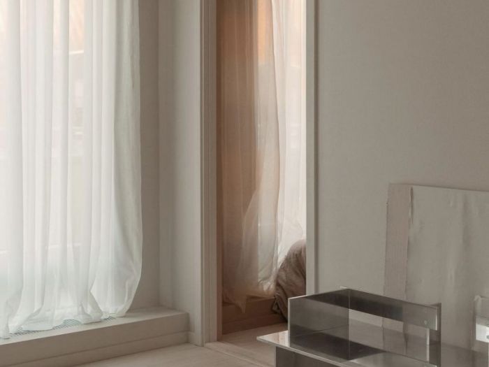 Archisio - Isidera - Progetto Laboratorio sartoria e tappezzeria milano