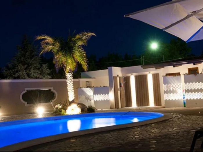 Archisio - Raffaele Carrella - Progetto Villa monofamiliare con piscina