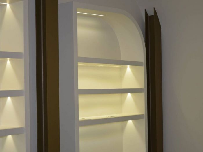 Archisio - Decora srl - Progetto Ristrutturazione negozio di abbigliamento