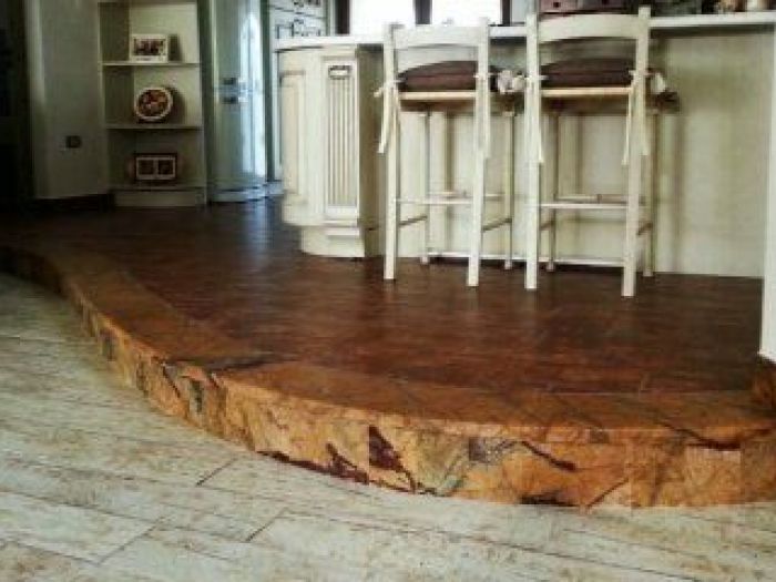 Archisio - Guglielmi Marmi Snc - Progetto Scalino e scalinata in forest brown tavolino in ferro battuto e forest brown caminetto rosso verona libreria in marmo portale in pietra tavolino con mosaico