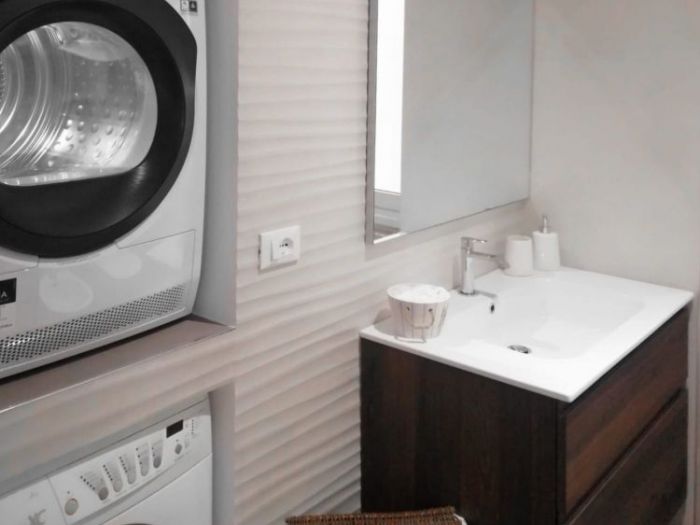 Archisio - Mani Srl Ristrutturazini - Progetto Bagno con vano lavatrice ed asciugatrice