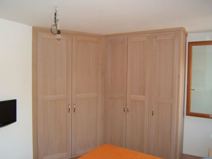 Archisio - Cordel Srl Arredamenti Artigianali - Progetto Armadio con cabina integrata per mansarda