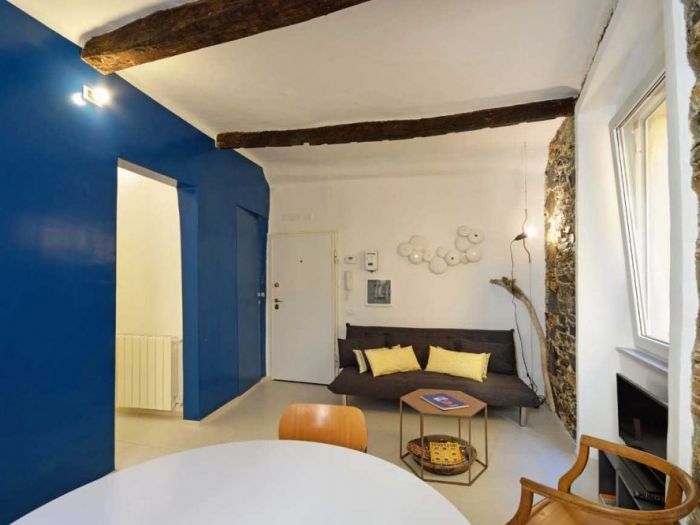 Archisio - Roberto Silvestri - Progetto Una casa a camogli storie e pareti colorate