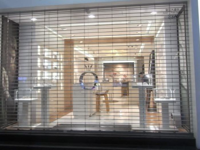 Archisio - Vetreria Melandri - Progetto Vetrine per negozi e uffici