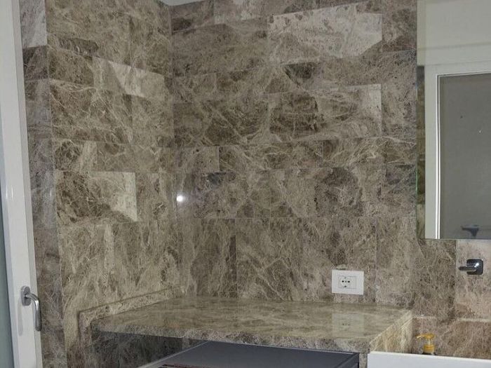 Archisio - Calabra Marmi - Progetto Bagni