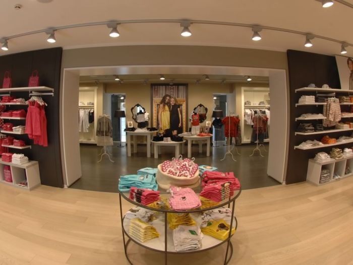 Archisio - Asso spa - Progetto Allestimento e arredamento di negozi