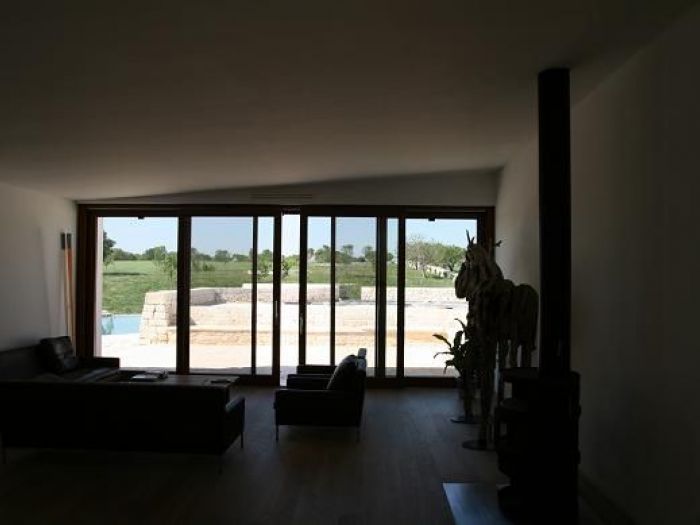 Archisio - Pietricola srl - Progetto Alzante scorrevole 2ante fisse e 2 scorrevoli legno lamellare rovere-alluminio effetto legno