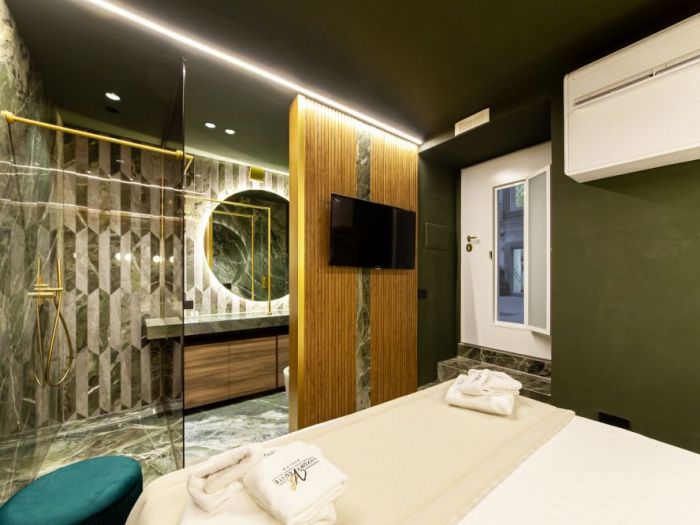 Archisio - Salvatore Sito - Progetto riflessi di marmo e ottone