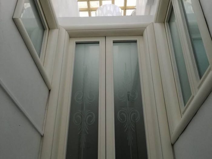 Archisio - Falegnameria Tuccitto - Progetto Porte in legno