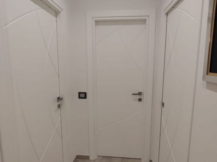 Archisio - Vincenzo Matarazzo - Progetto Ristrutturazione di una casa moderna con toni caldi ed accoglienti