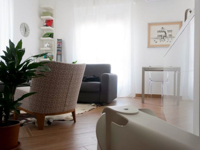 Archisio - Studio Ferretti - Progetto Da ufficio a residenza