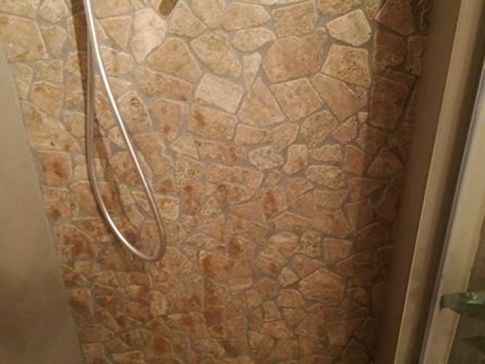 Archisio - Malagrida Group Srl Canalina Infinity - Progetto Villa privata - interno bagno