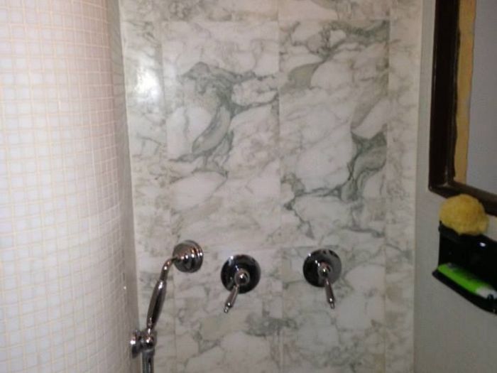 Archisio - Ea Works srl - Progetto Rinnovo bagni e illuminazione in provincia di roma