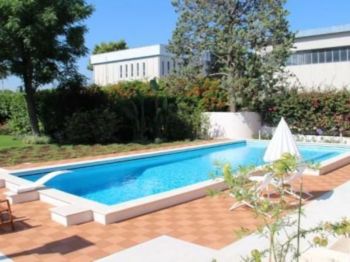 Archisio - Enrica Leonardis - Progetto Giardino e bordo piscina in villa urbana