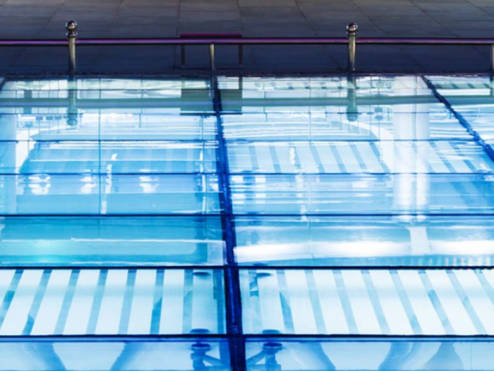 Archisio - Vetreria Dimensione Vetro - Progetto Parapetti e scale pensiline in vetro porte calpestabili e vetri decorati