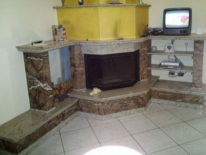 Archisio - Calabra Marmi - Progetto Camini