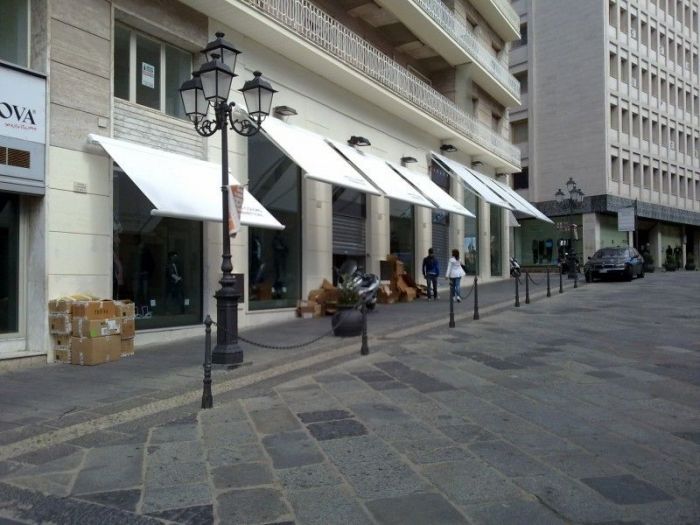 Archisio - Errico Gaglianese - Progetto Realizzazione punti vendita benetton e sisley di catanzaro