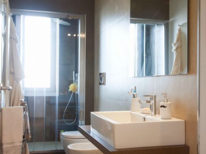 Archisio - Studio Ferretti - Progetto Da ufficio a residenza