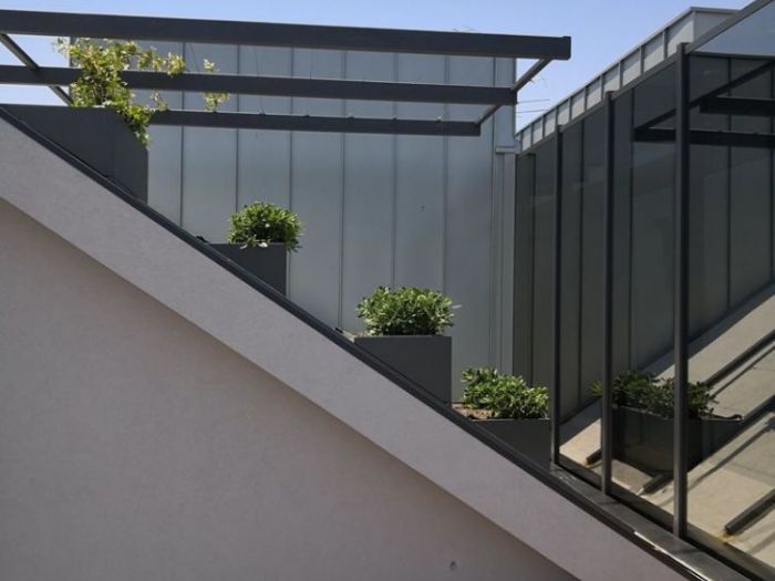 Archisio - Alfio Carmelo Lombardo - Progetto Structured attic with aluminum frames and glass titanium zinc cover