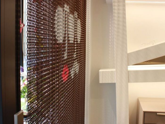 Archisio - Marcello Gennari - Progetto Ottica montevecchio a fano