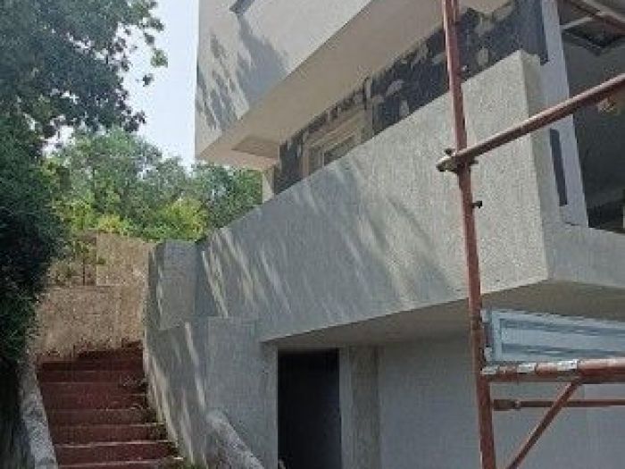 Archisio - Flavio Di Fiore - Progetto Trasformazione di due ville del 1974 in case vacanza