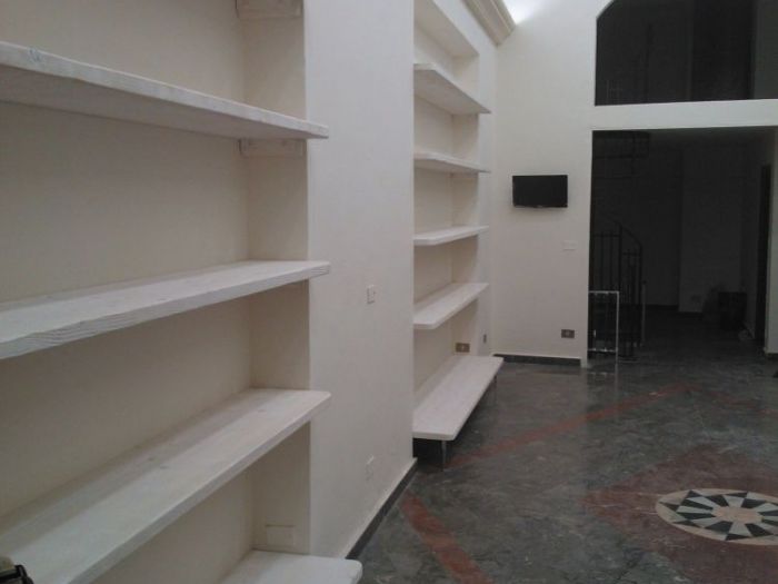 Archisio - Salvatore Bottone - Progetto Arredamento negozio libreria