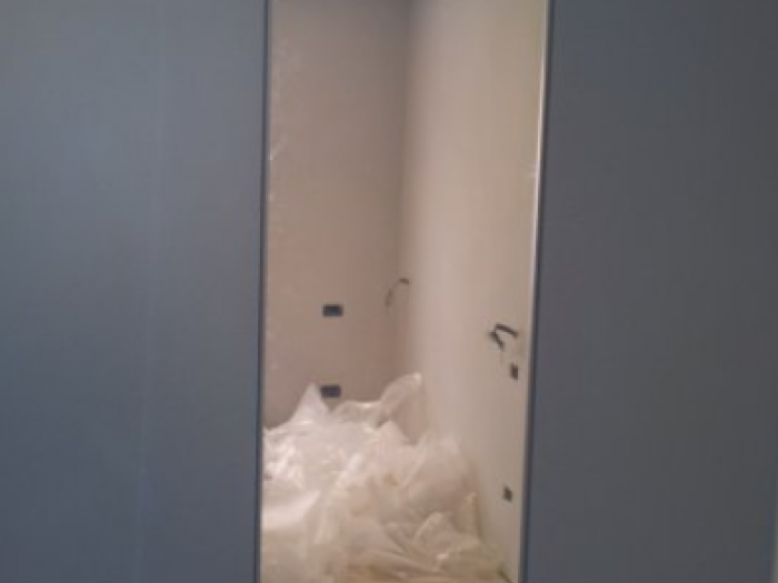 Archisio - Arte Del Legno 86 Snc - Progetto Armadio a muro laccato grigio