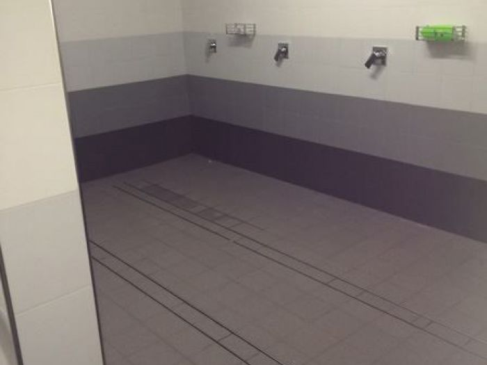 Archisio - Malagrida Group Srl Canalina Infinity - Progetto Stadio del friuli - spogliatoi